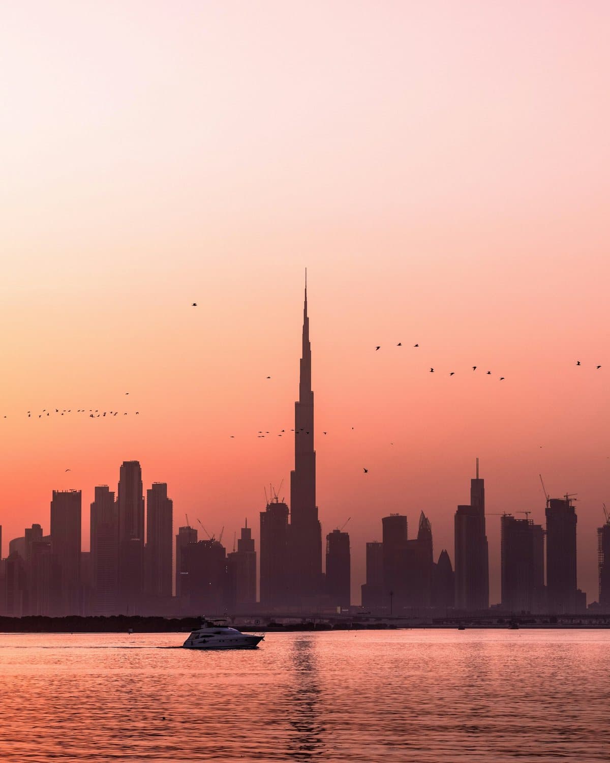 Dubai skyline at sunset, seen from Dubai Creek Harbour