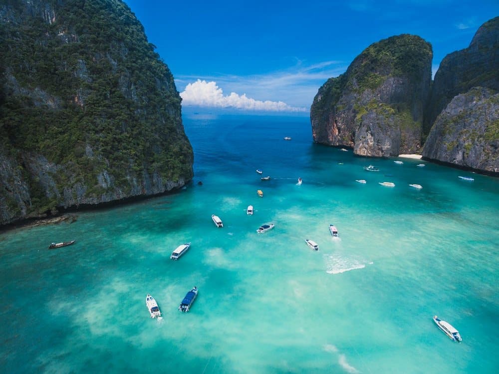 Boats in the turquoise water of Maya Bay, Phi Phi Islands